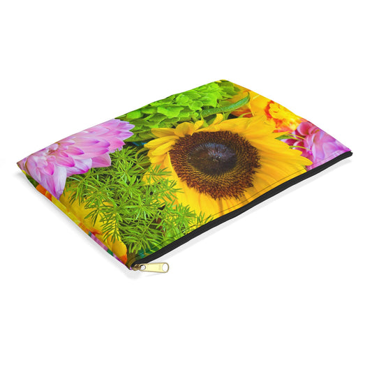 Small pouch with flower bouquet design lying flat, showcasing the slim profile feature.