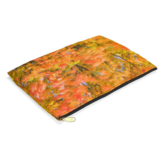 Small pouch with fall colored trees design lying flat, showcasing the slim profile feature.