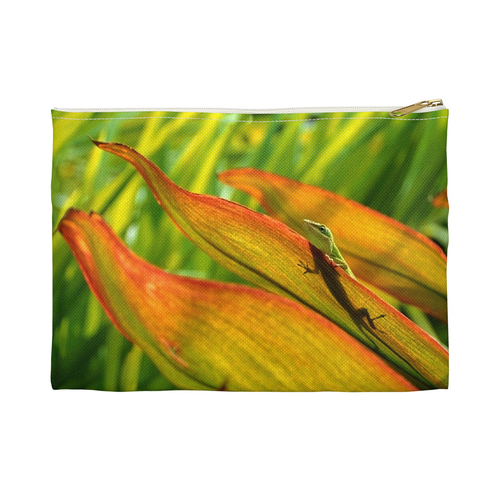 Front view of the small 8.5 x 6 inch pouch with sunlit gecko design and white zipper.