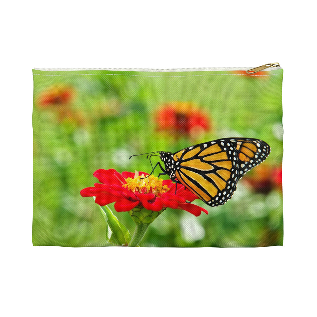 Front view of the small 8.5 x 6 inch pouch with butterfly on flower design and white zipper.