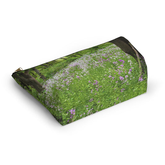 Bottom view of the kit bag with forest wildflowers design angled to showcase the depth and all over print design.