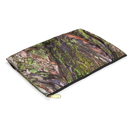 Small pouch with green mossy bark design lying flat, showcasing the slim profile feature.