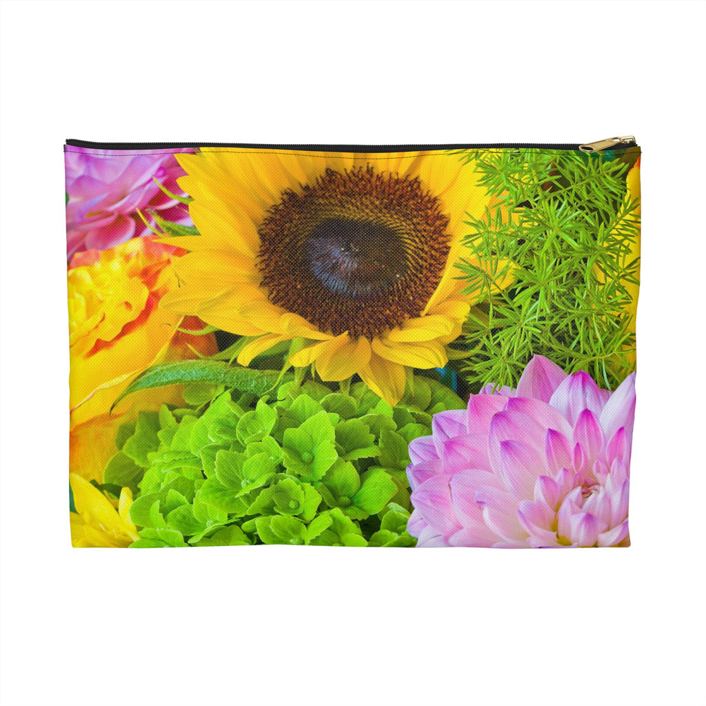 Zippered accessory pouch featuring vibrant photo art of sunflower amid tight cluster of brilliantly colored blooms.