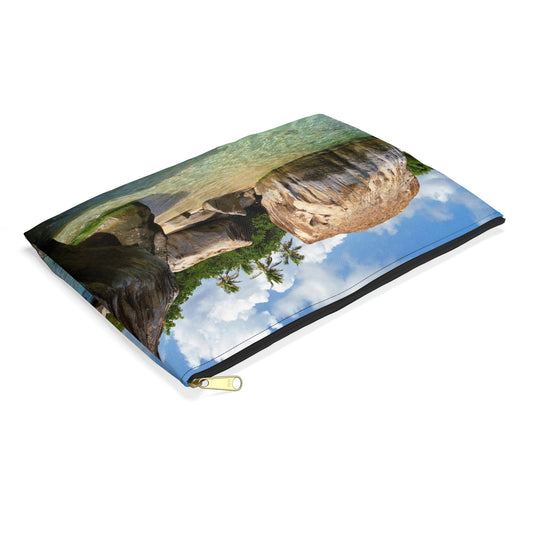 Small pouch with calm turquoise water design lying flat, showcasing the slim profile feature.