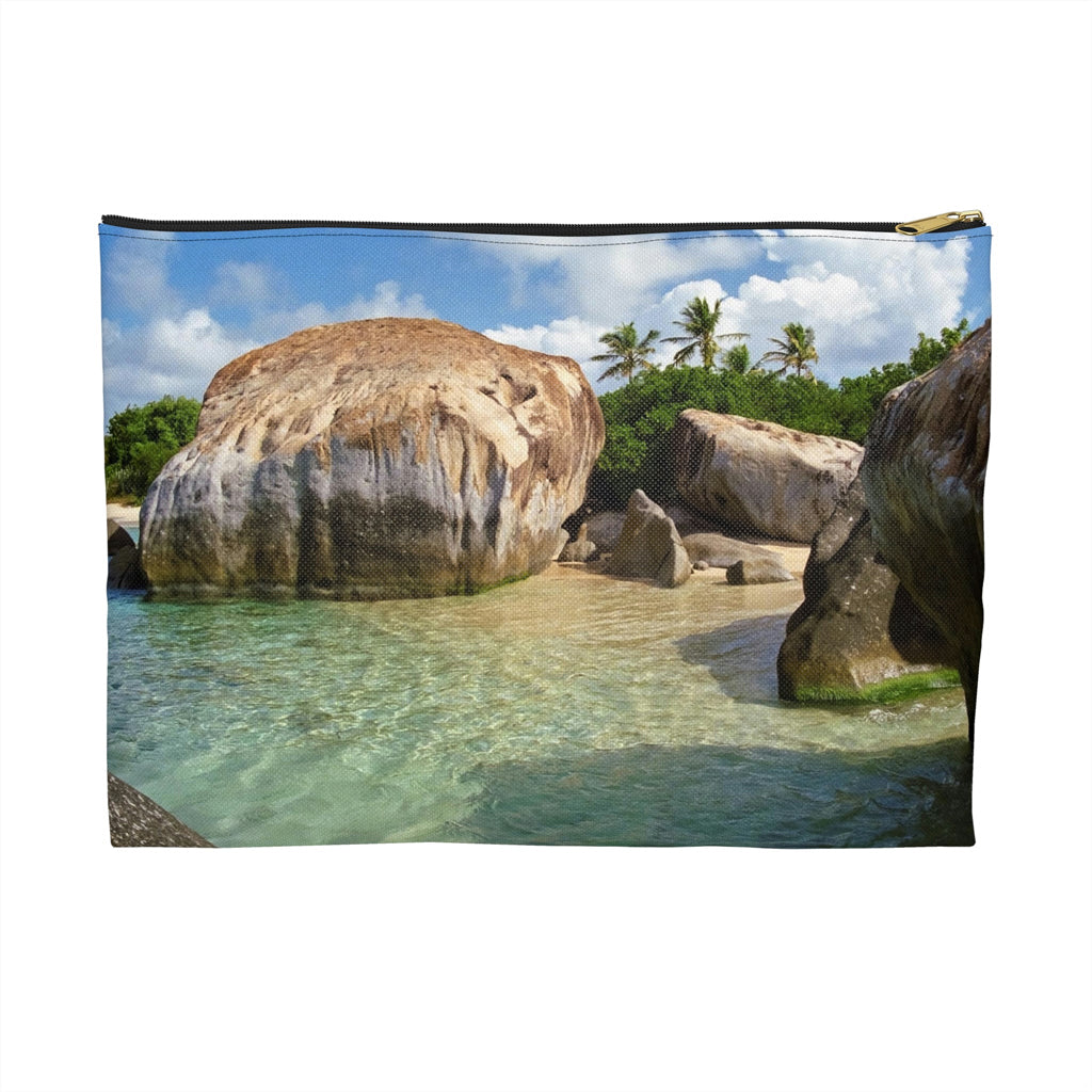 Zippered accessory pouch featuring vibrant photo art of Caribbean beach, calm turquoise pool sheltered by huge boulders.
