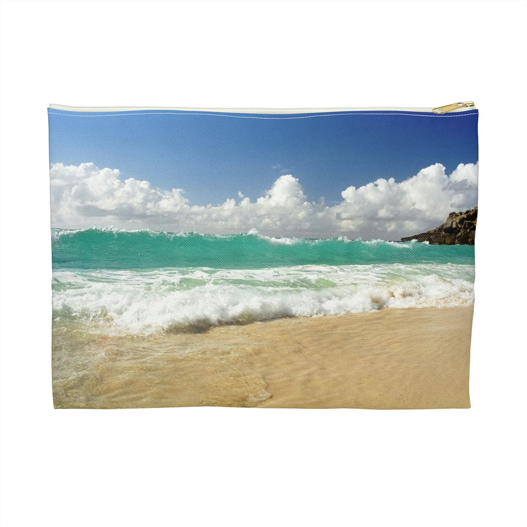 Zippered accessory pouch featuring vibrant photo art of a vast turquoise Caribbean wave cresting and crashing onto the beach.