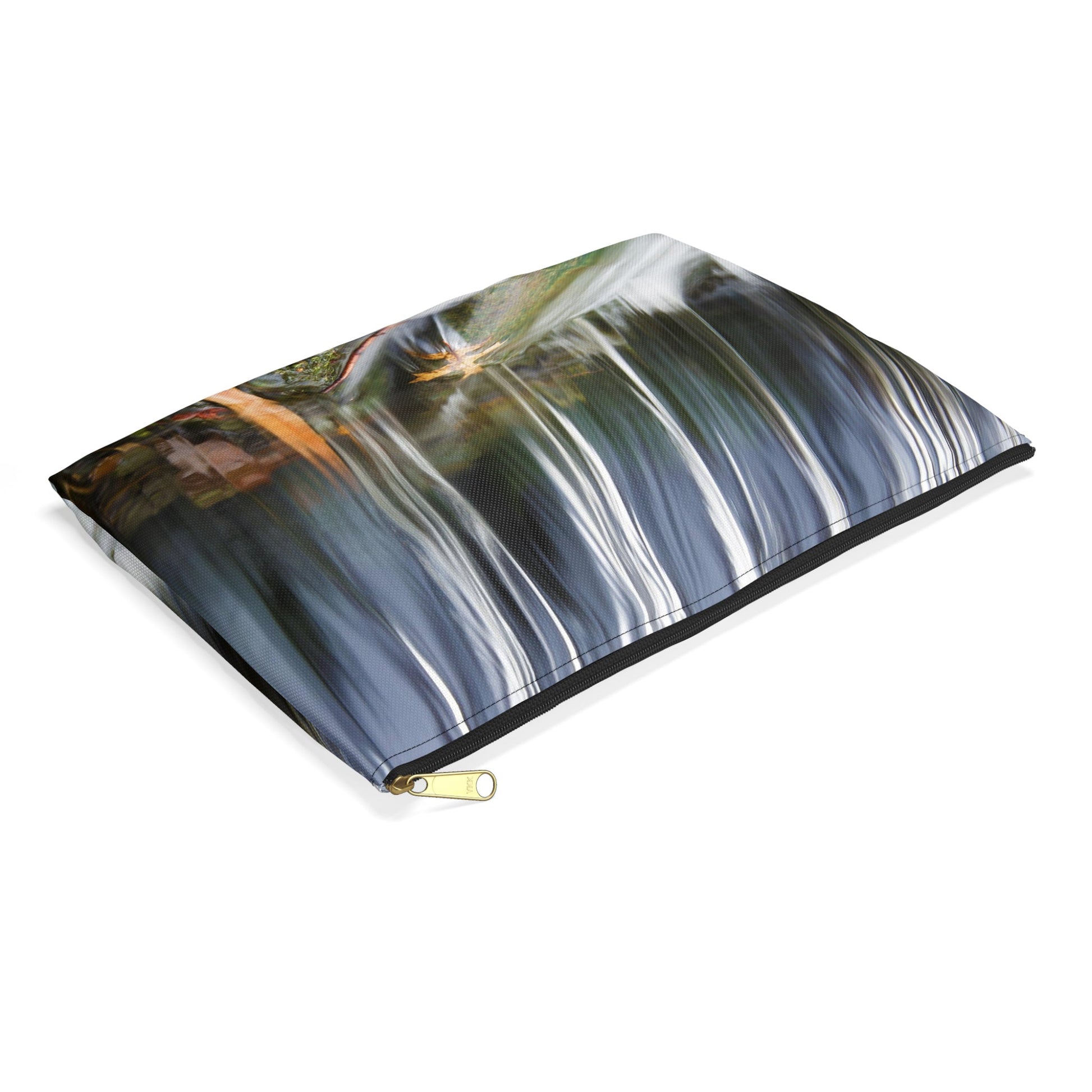 Small pouch with creek waterfall design lying flat, showcasing the slim profile feature.