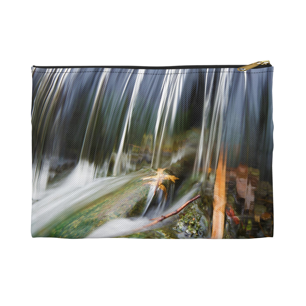 Front view of the small 8.5 x 6 inch pouch with creek waterfall design and black zipper.
