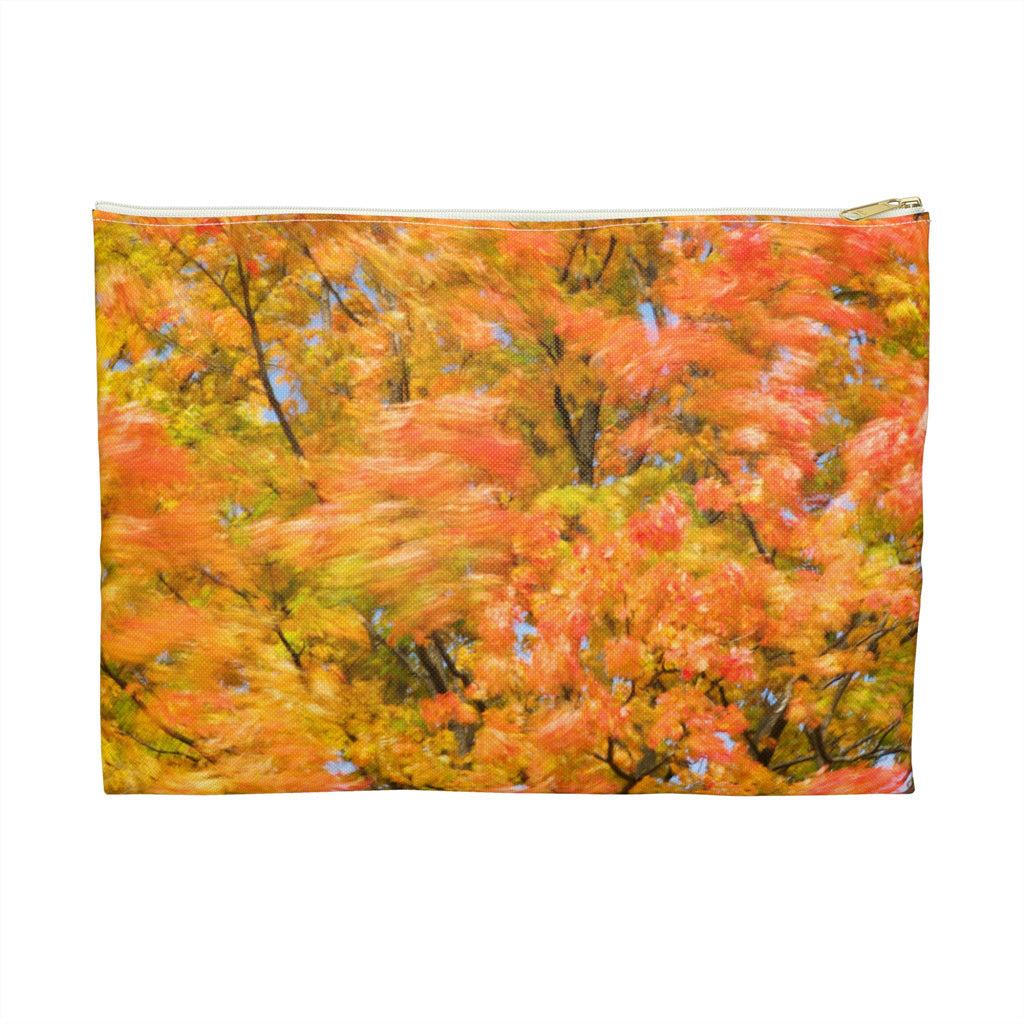 Front view of the large 12 x 8.75 inch pouch with fall colored trees design and white zipper.