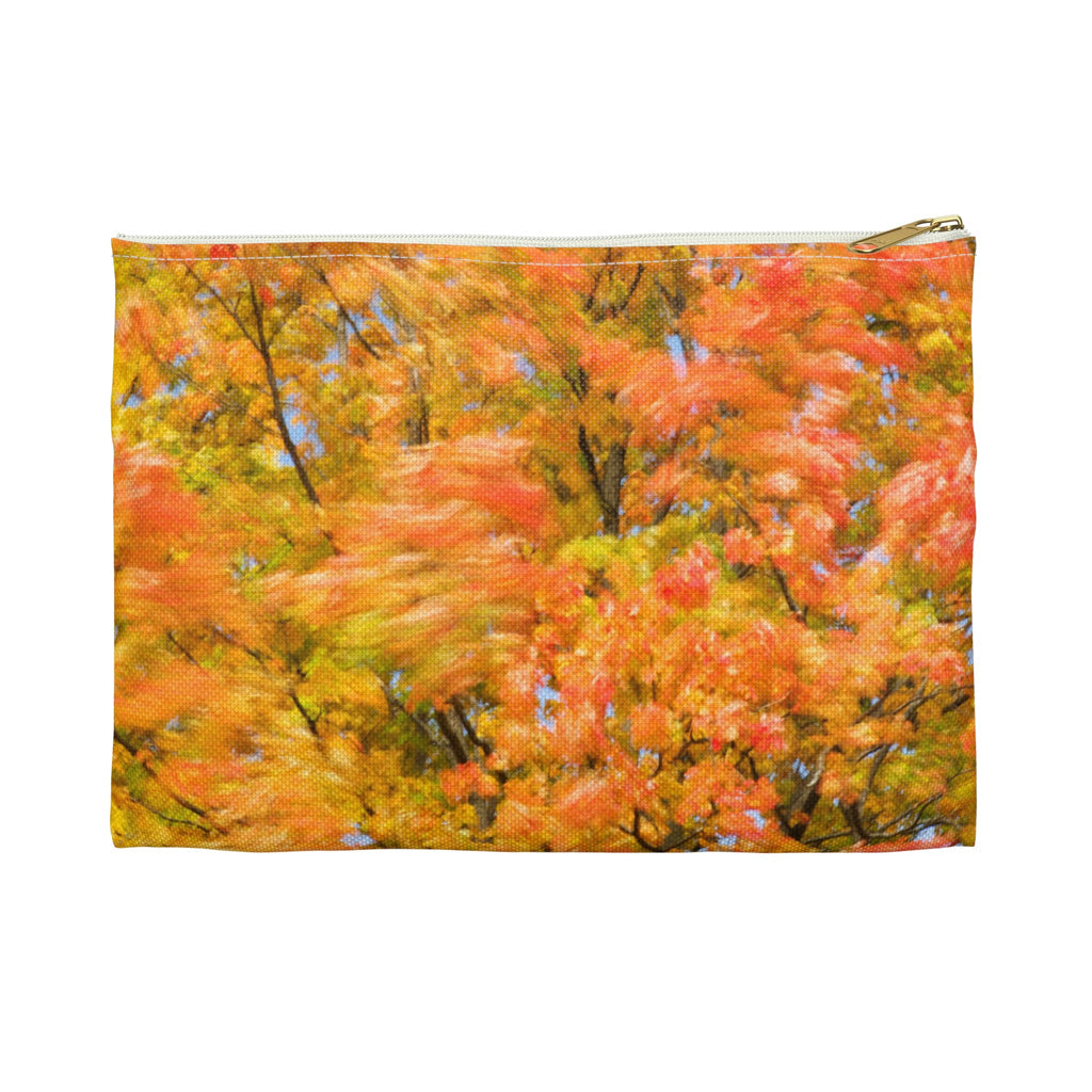 Front view of the small 8.5 x 6 inch pouch with fall colored trees design and white zipper.