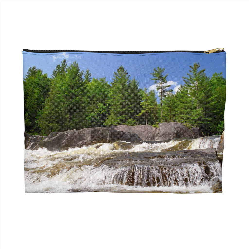 Front view of the large 12 x 8.75 inch pouch with forest waterfall design and black zipper.