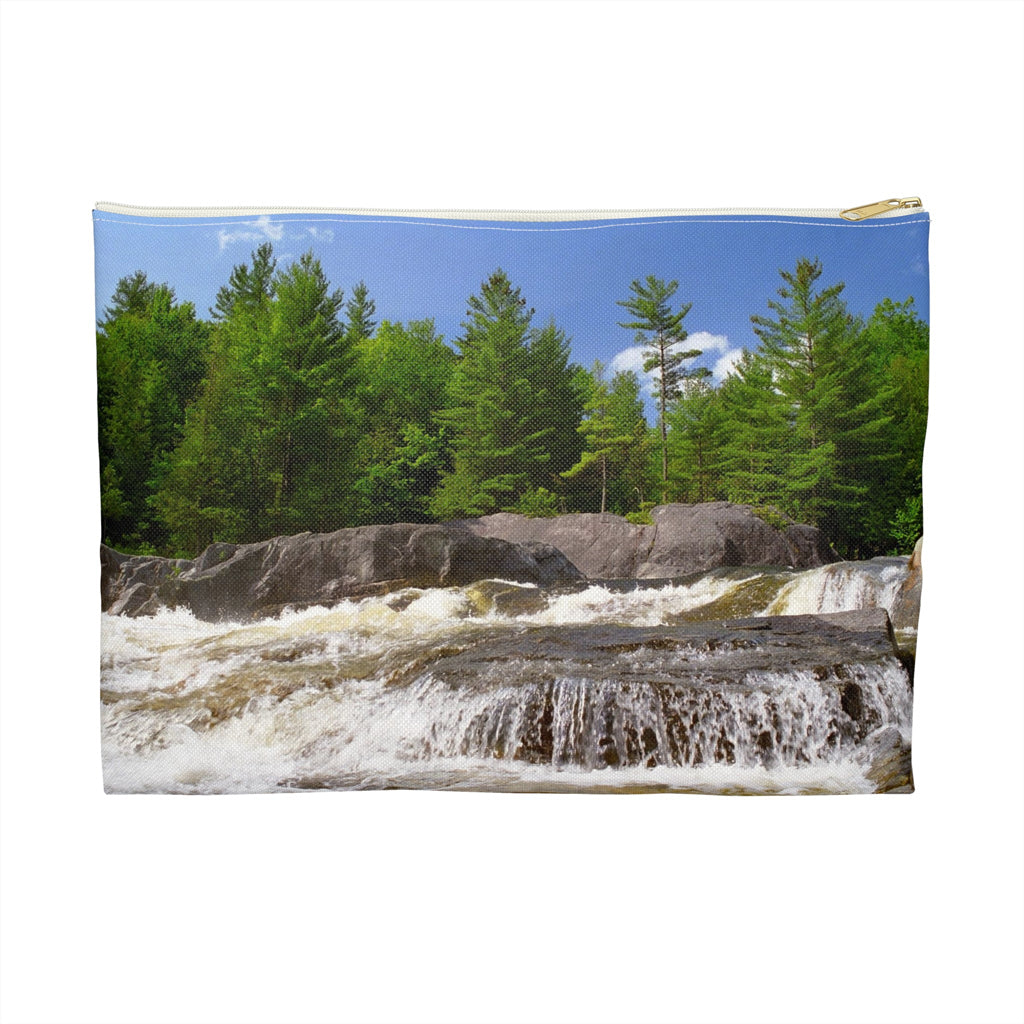 Zippered accessory pouch featuring vibrant photo art of lush green forest at the edge of a raging Adirondack waterfall.