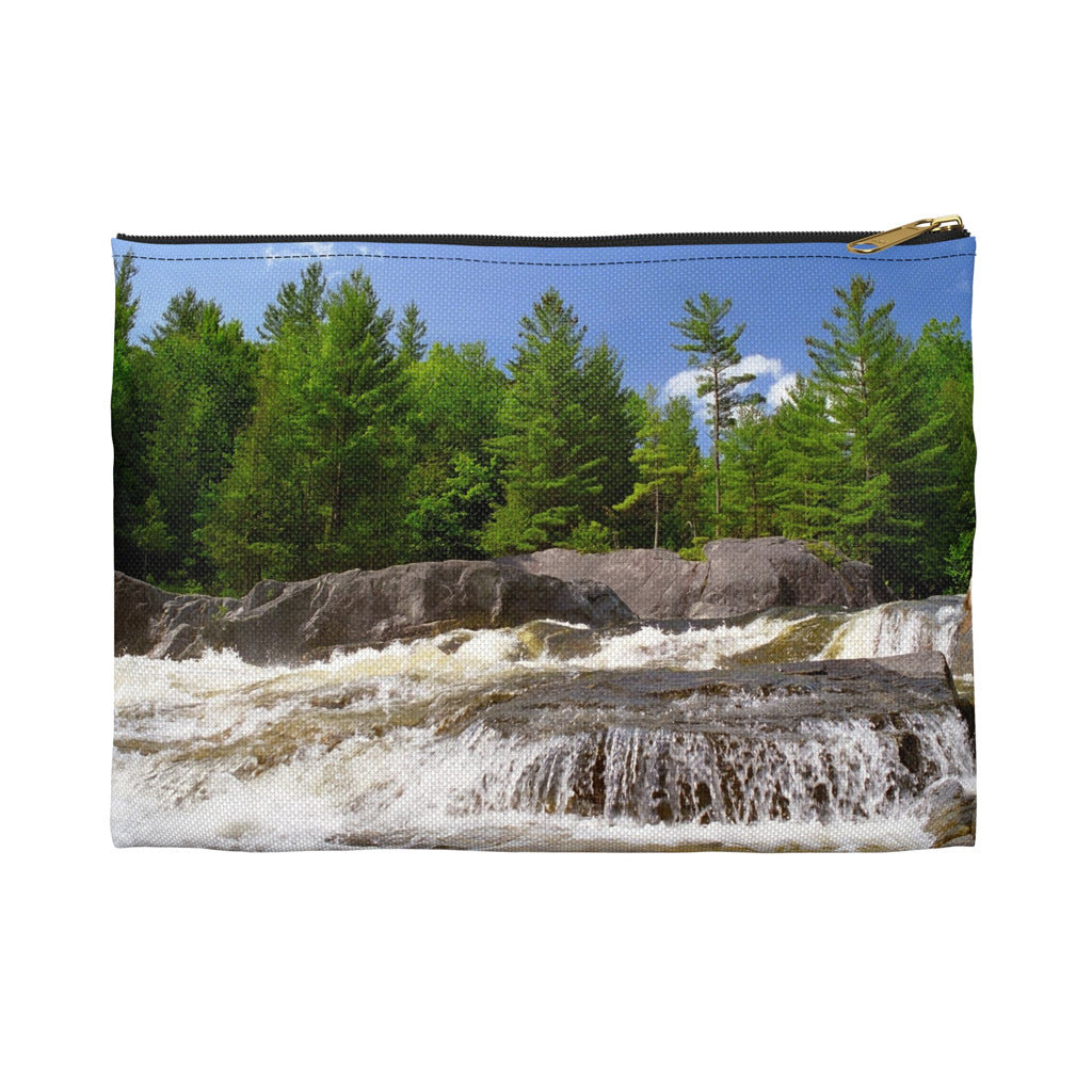 Front view of the small 8.5 x 6 inch pouch with forest waterfall design and black zipper.