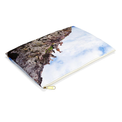 Small pouch with curious goats design lying flat, showcasing the slim profile feature.