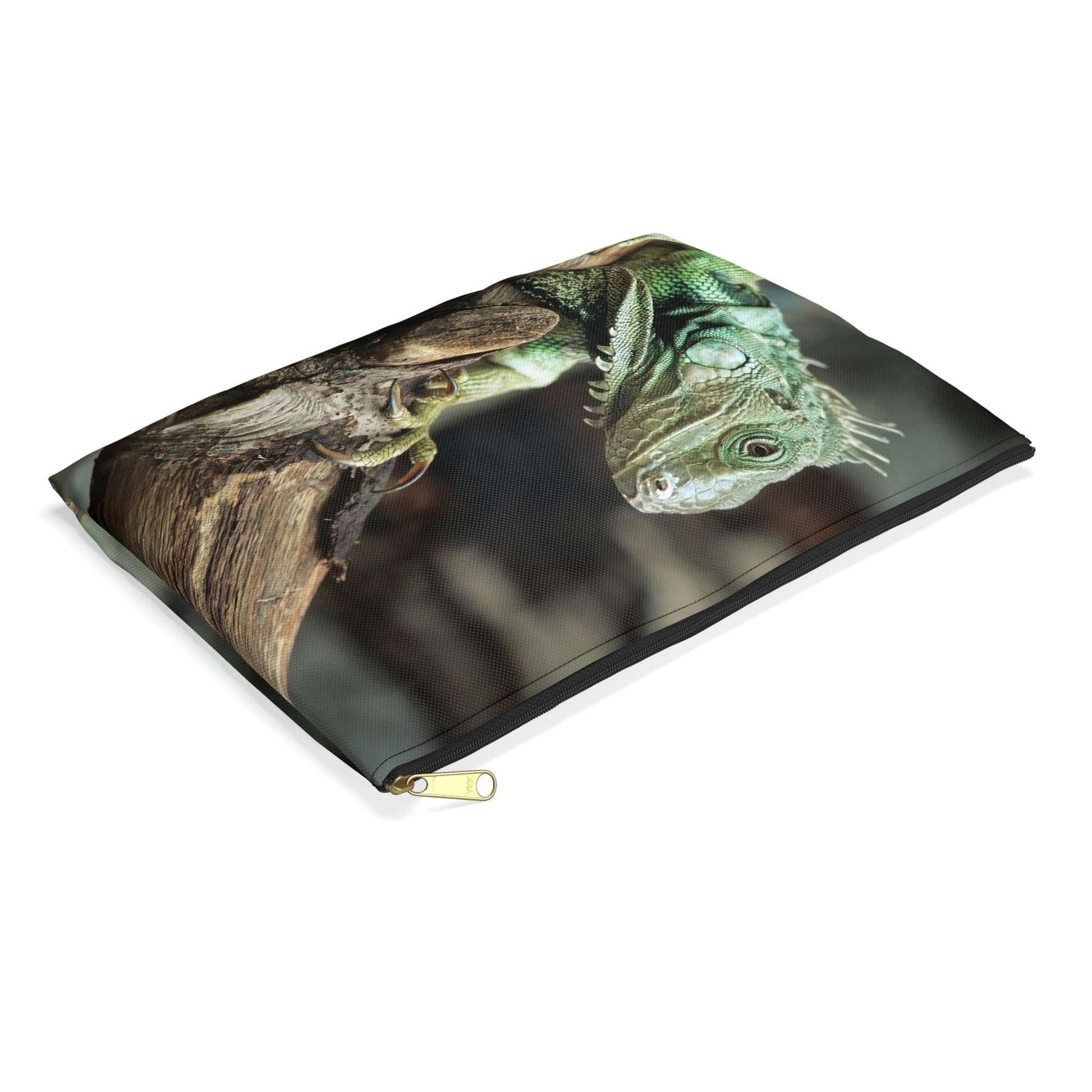Small pouch with green iguana design lying flat, showcasing the slim profile feature.