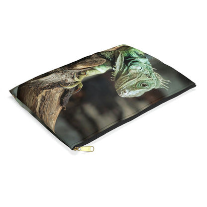 Small pouch with green iguana design lying flat, showcasing the slim profile feature.