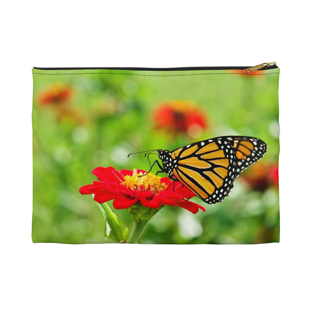 Front view of the small 8.5 x 6 inch pouch with butterfly on flower design and black zipper.