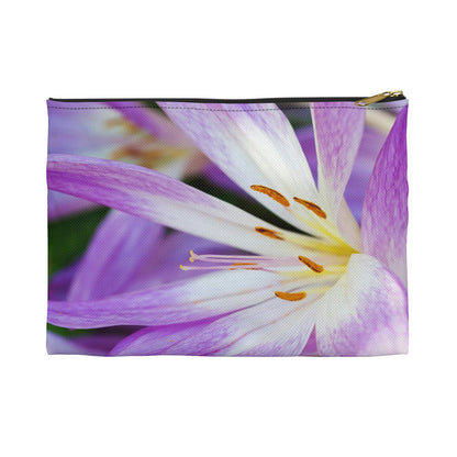 Front view of the small 8.5 x 6 inch pouch with purple flower, orange stamen design and black zipper.
