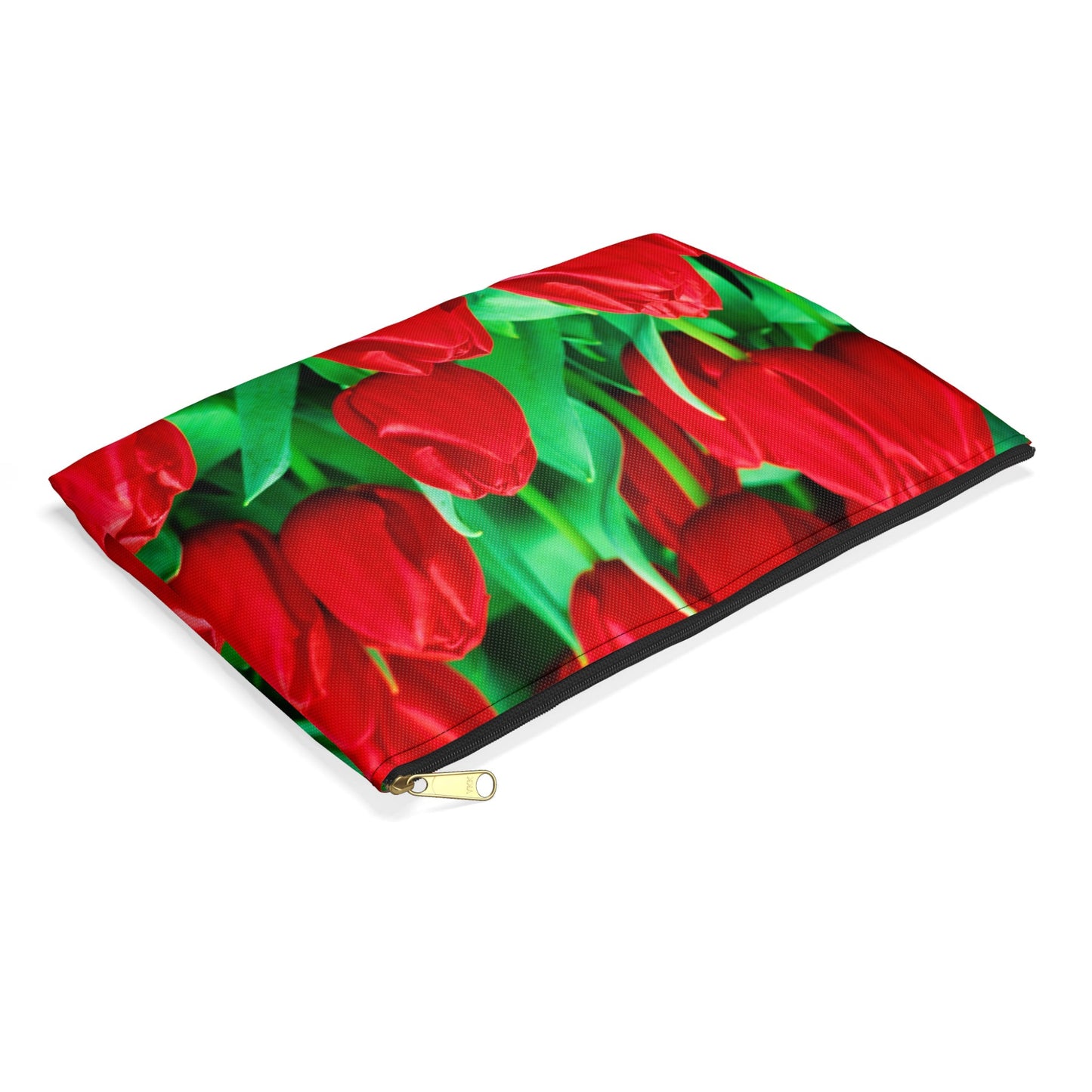 Small pouch with red tulips design lying flat, showcasing the slim profile feature.