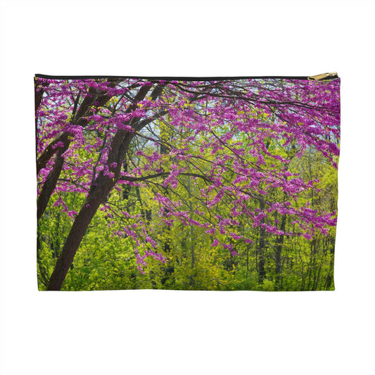 Zippered accessory pouch featuring vibrant photo art of a tree filled with violet colored spring buds and blooms.
