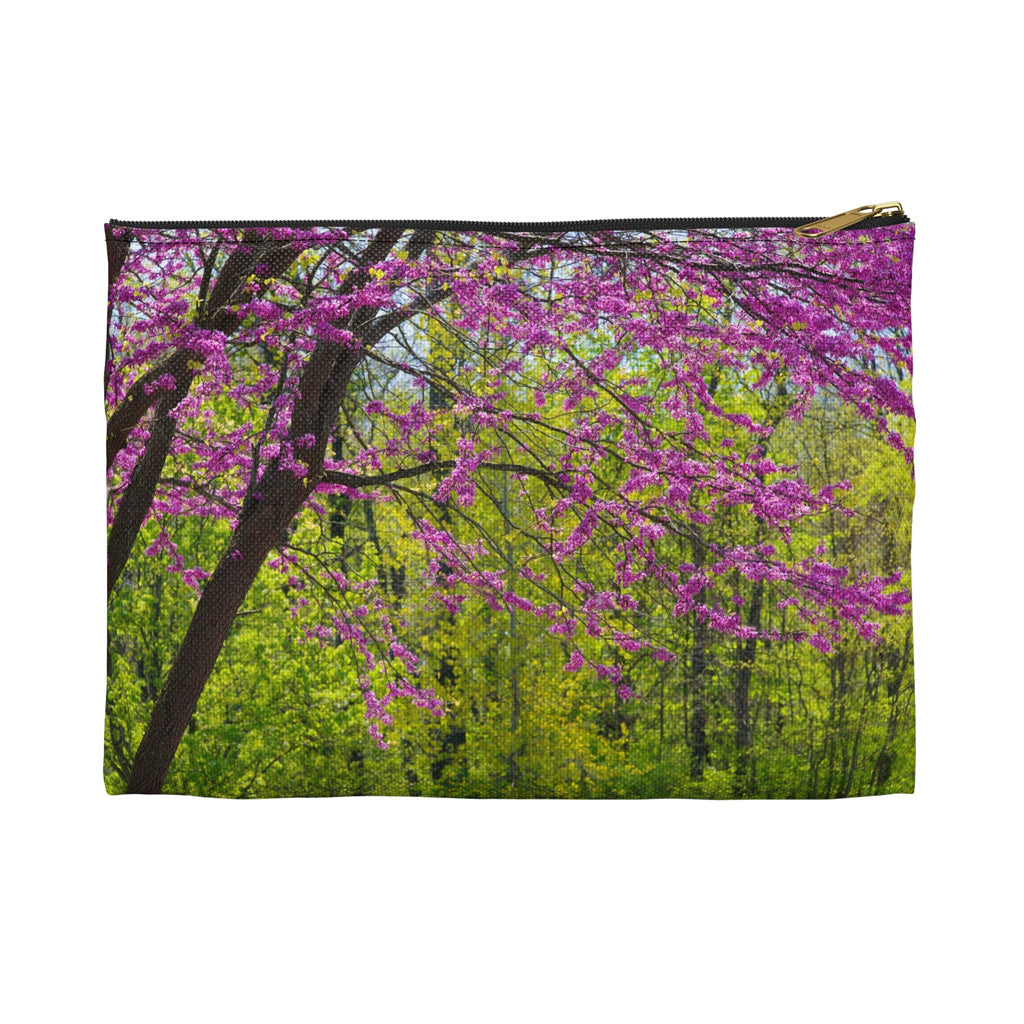 Front view of the small 8.5 x 6 inch pouch with tree blossoms design and black zipper.