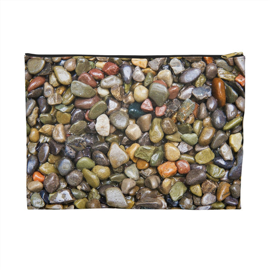 Zippered accessory pouch featuring vibrant photo art close up of wet glistening multi colored pebbles and stones.
