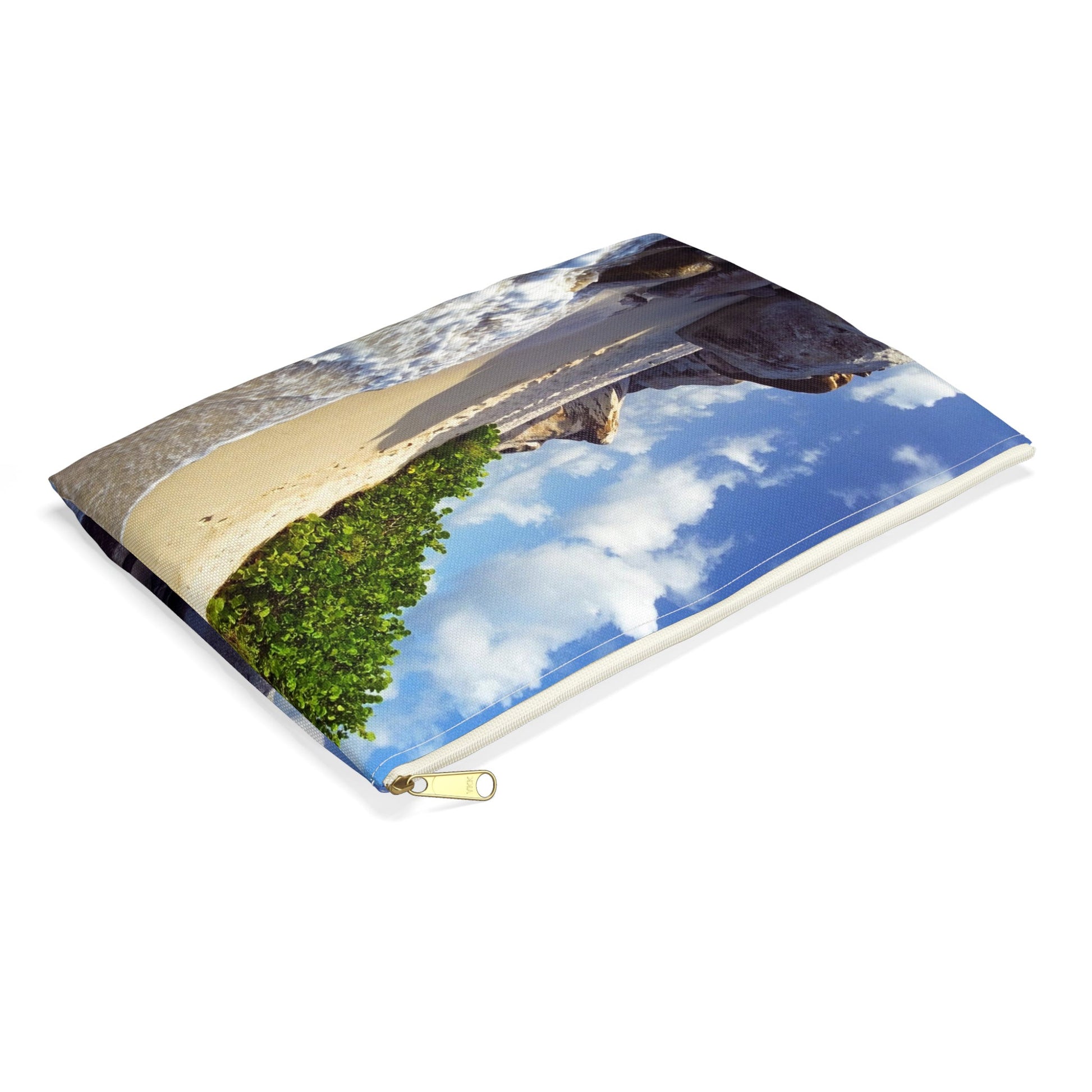 Small pouch with beach surf design lying flat, showcasing the slim profile feature.