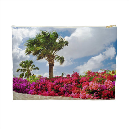 Zippered accessory pouch featuring vibrant photo art of a Caribbean blue sky, windy palm trees and brilliant tropical flowers.