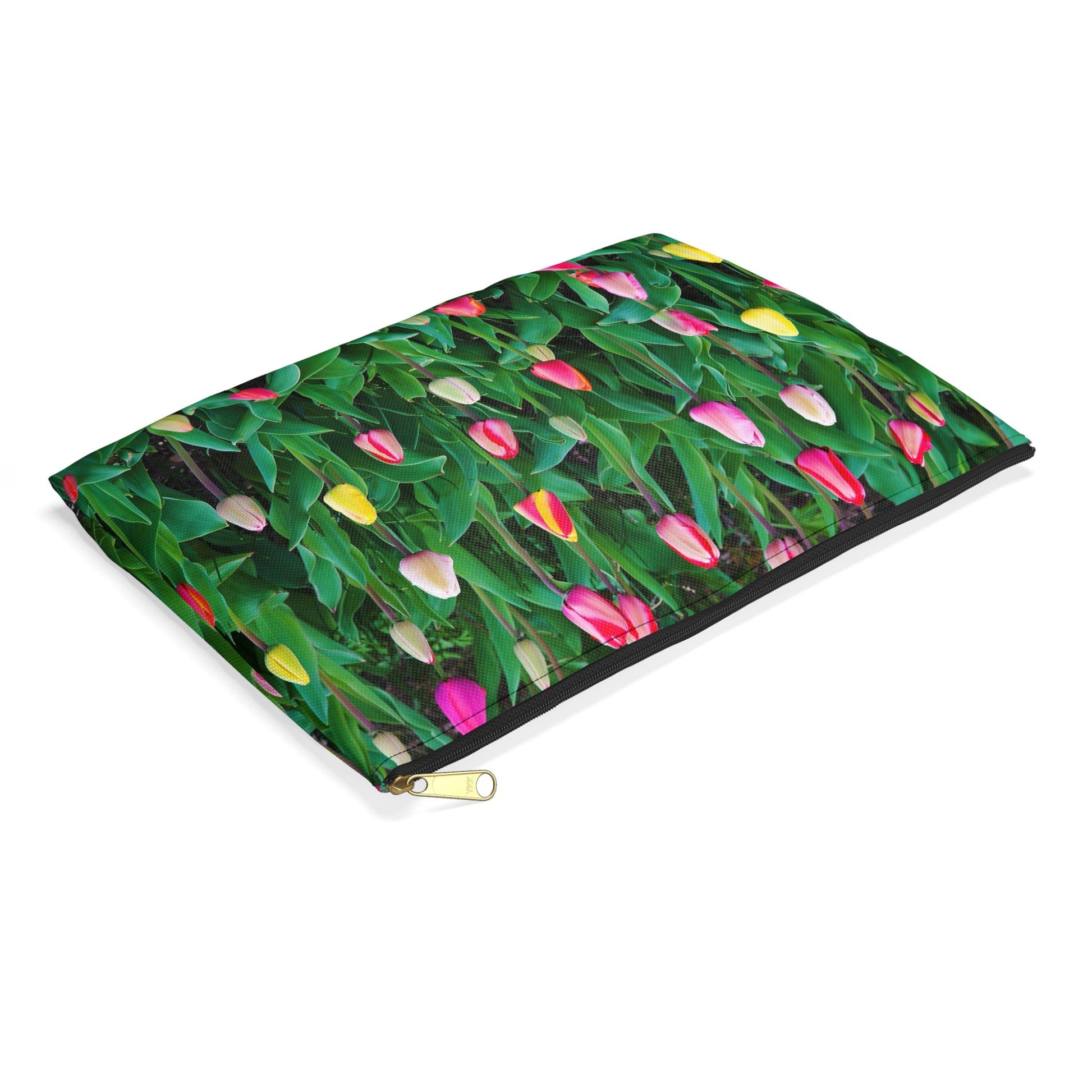 Small pouch with multi colored tulips design lying flat, showcasing the slim profile feature.