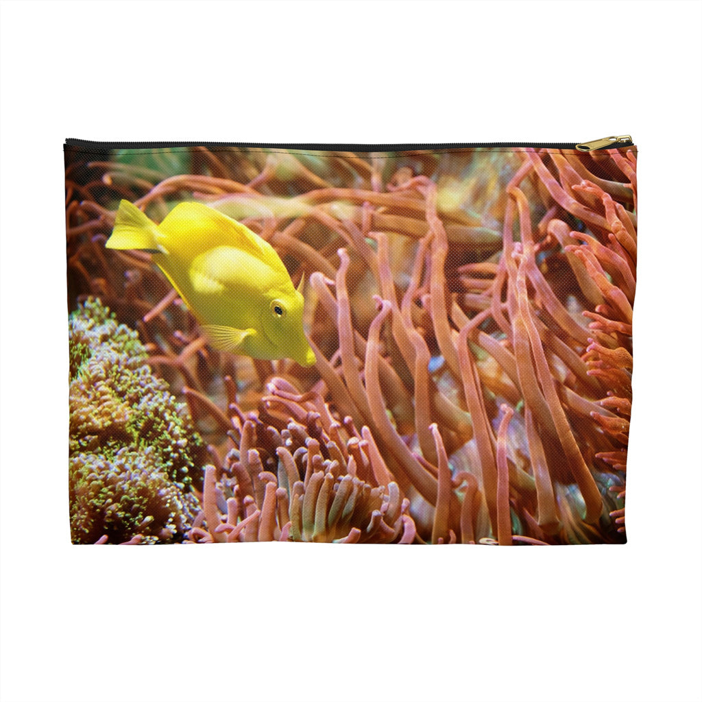 Zippered accessory pouch featuring vibrant photo art of a bright yellow fish swimming among sea anemones and plants.