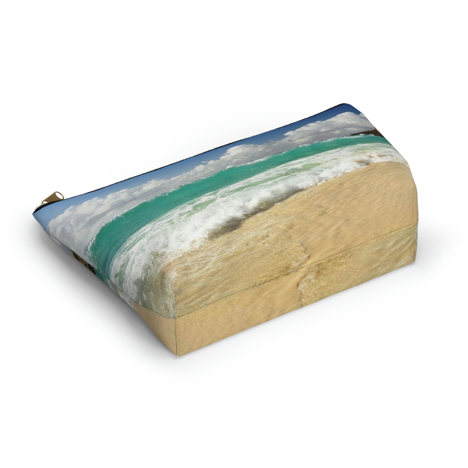 Bottom view of the kit bag with crashing waves design angled to showcase the depth and all over print design.