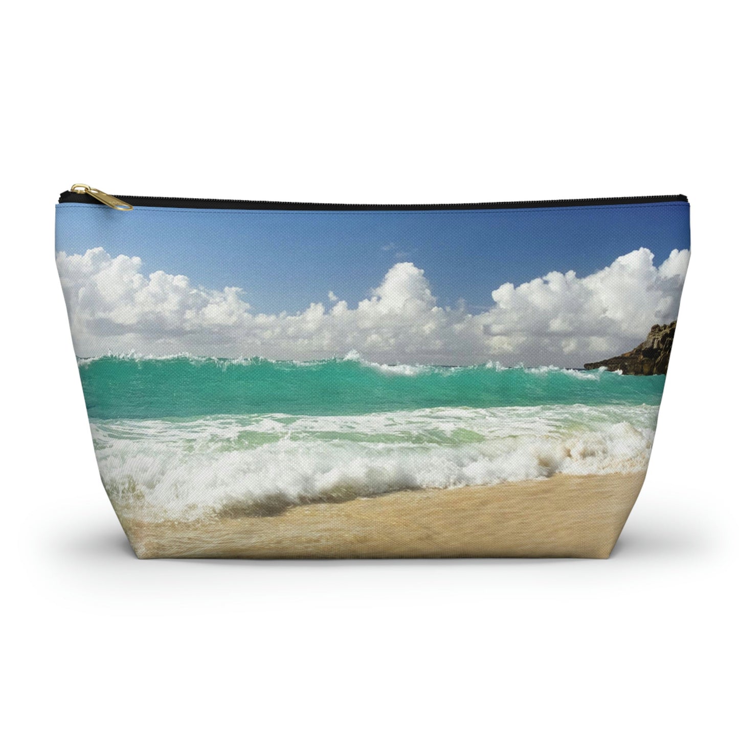 Front view of the large 12.5 x 7.25 x 3.25 inch kit bag with crashing waves design and black zipper.