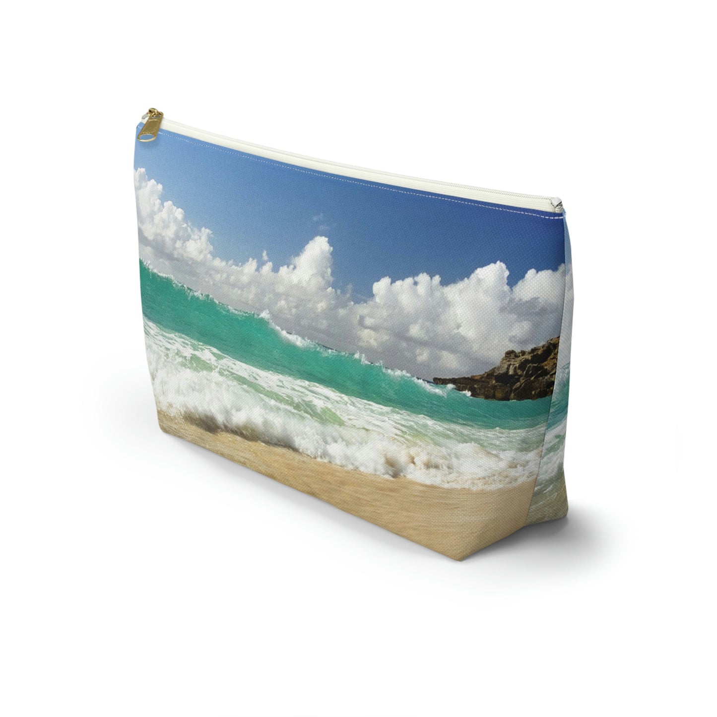 Front view of the kit bag with crashing waves design angled to showcase the depth and all over print design.