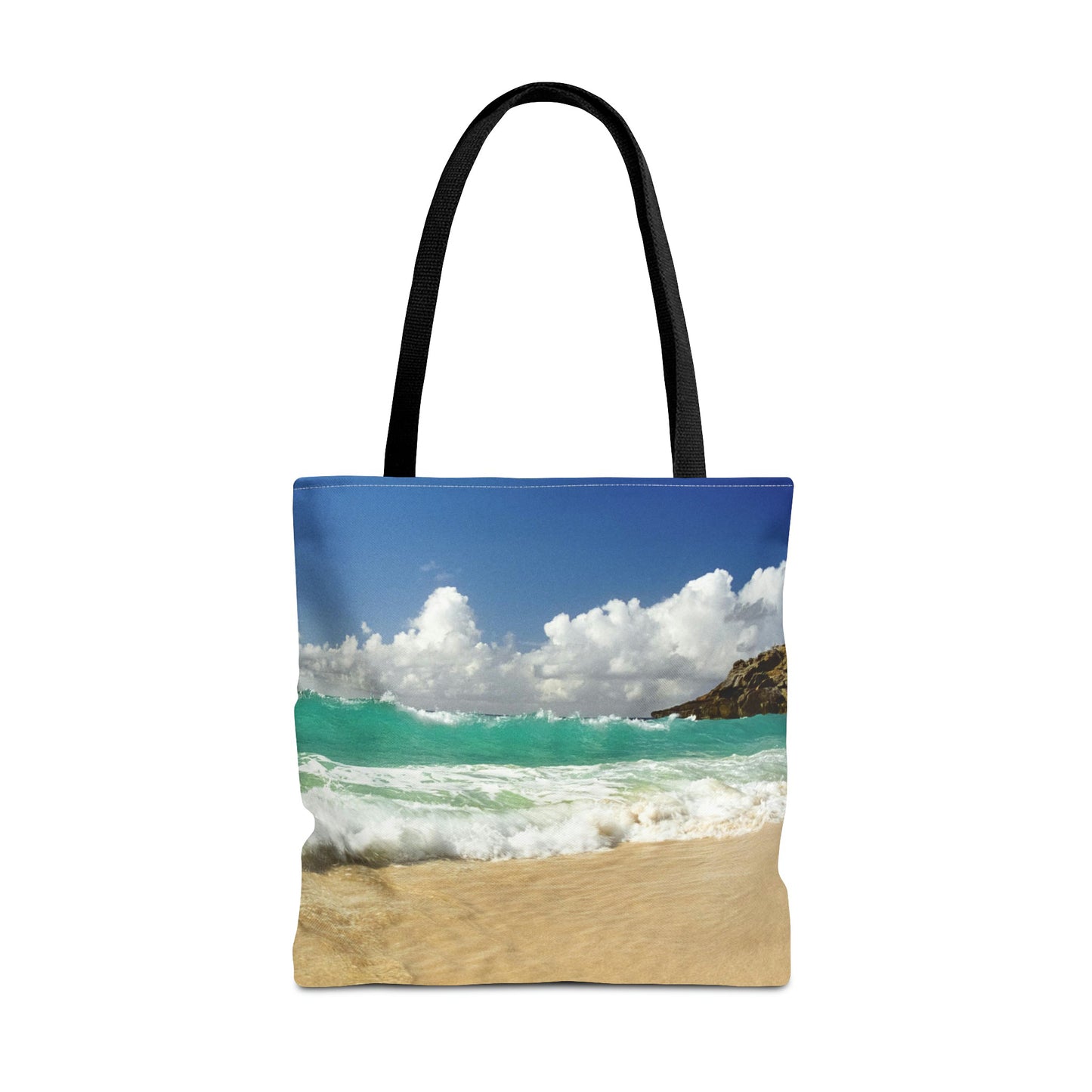 Large 18 x 18 inch tote bag featuring vibrant photo art of a vast turquoise Caribbean wave cresting about to crash on to the beach. 