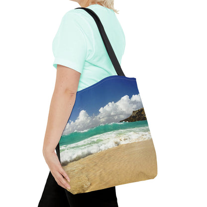 Young woman with a tote bag featuring the crashing waves design draped across her shoulder.