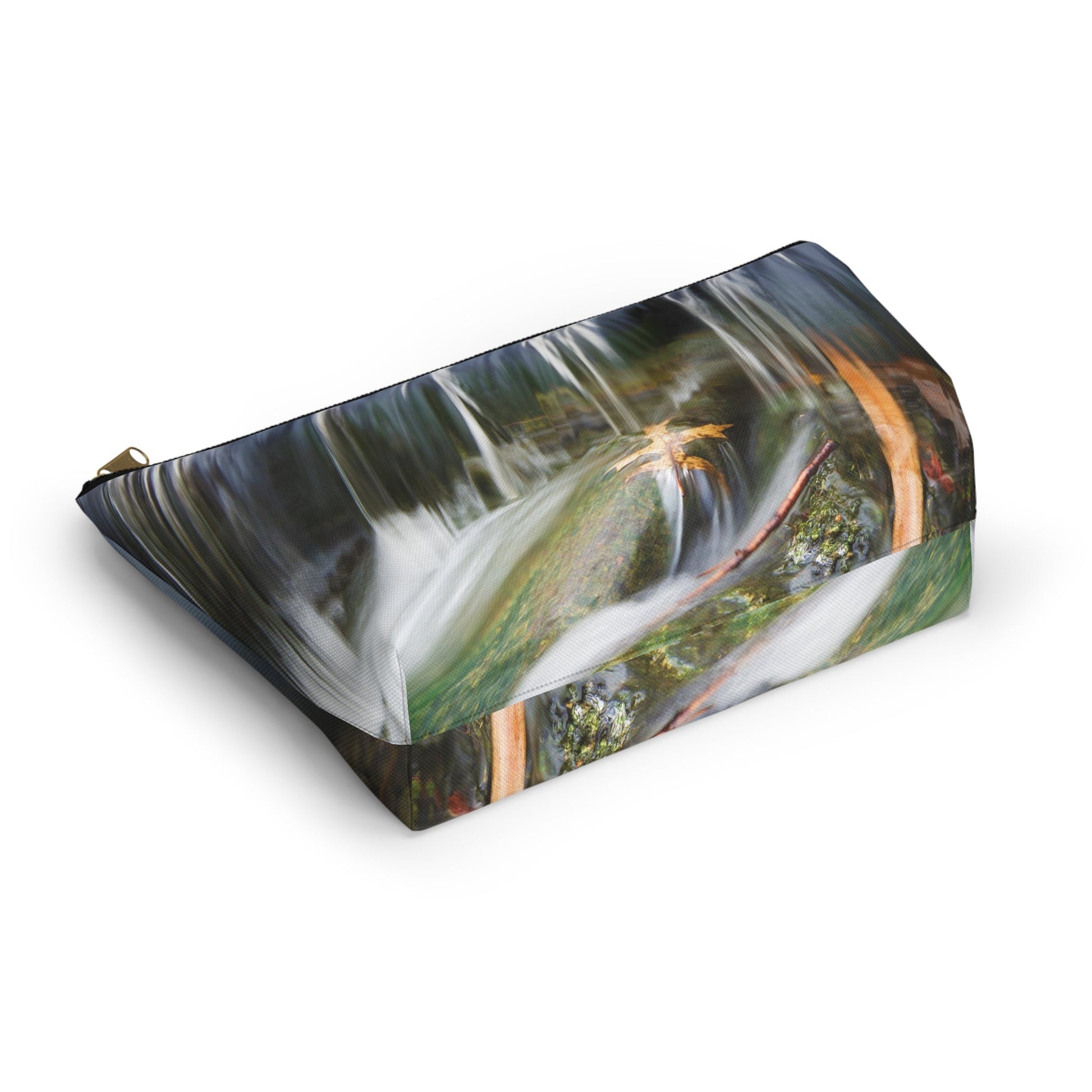 Bottom view of the kit bag with creek waterfall design angled to showcase the depth and all over print design.