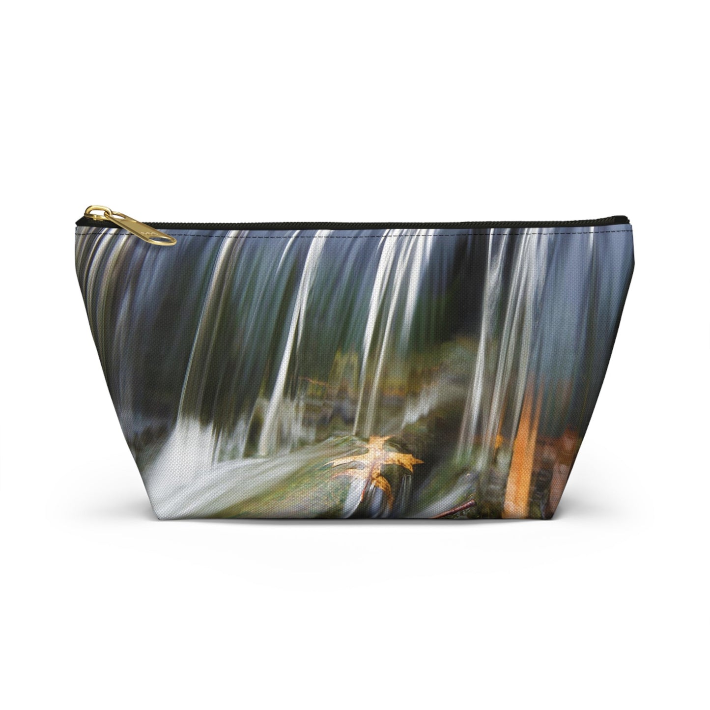 Front view of the small 8.75 x 4.75 x 2.25 inch kit bag with creek waterfall design and black zipper.