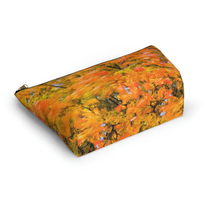 Bottom view of the kit bag with fall colored trees design angled to showcase the depth and all over print design.