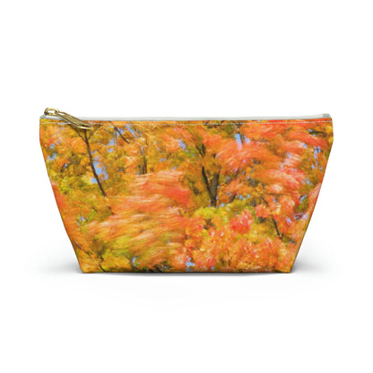 Front view of the small 8.75 x 4.75 x 2.25 inch kit bag with fall colored trees design and white zipper.
