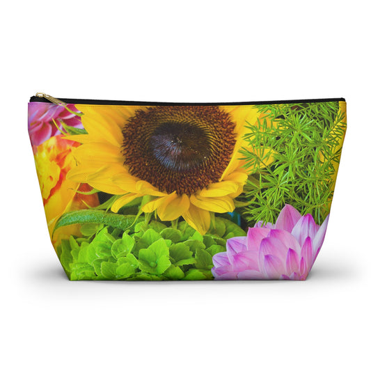 Zippered kit bag featuring vibrant photo art of sunflower amid tight cluster of brilliantly colored blooms.