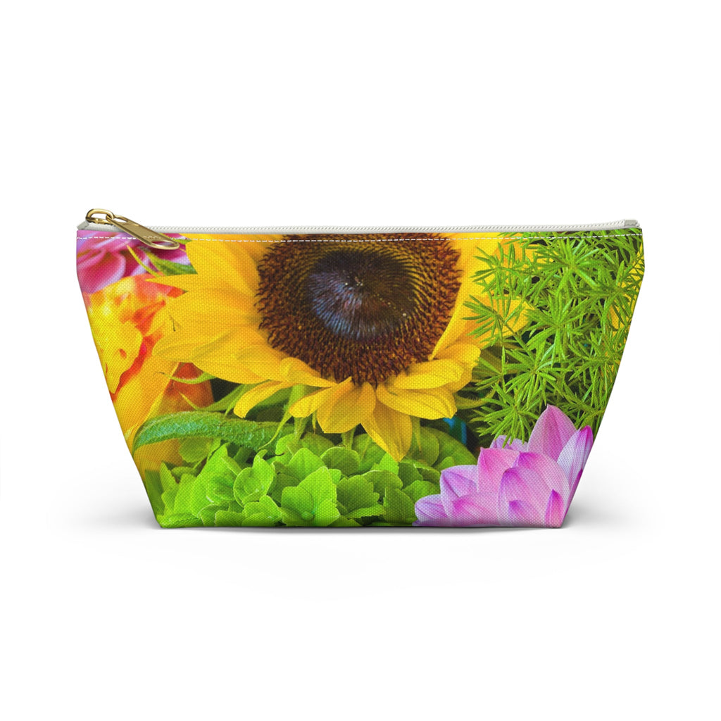 Front view of the small 8.75 x 4.75 x 2.25 inch kit bag with flower bouquet design and white zipper.