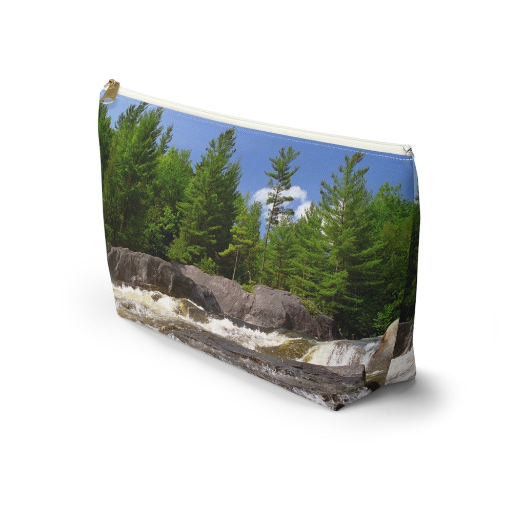 Front view of the kit bag with forest waterfall design angled to showcase the depth and all over print design.