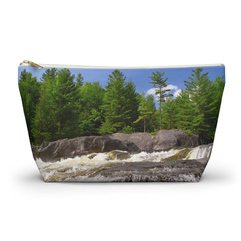 Zippered kit bag featuring vibrant photo art of lush green forest at the edge of a raging Adirondack waterfall.