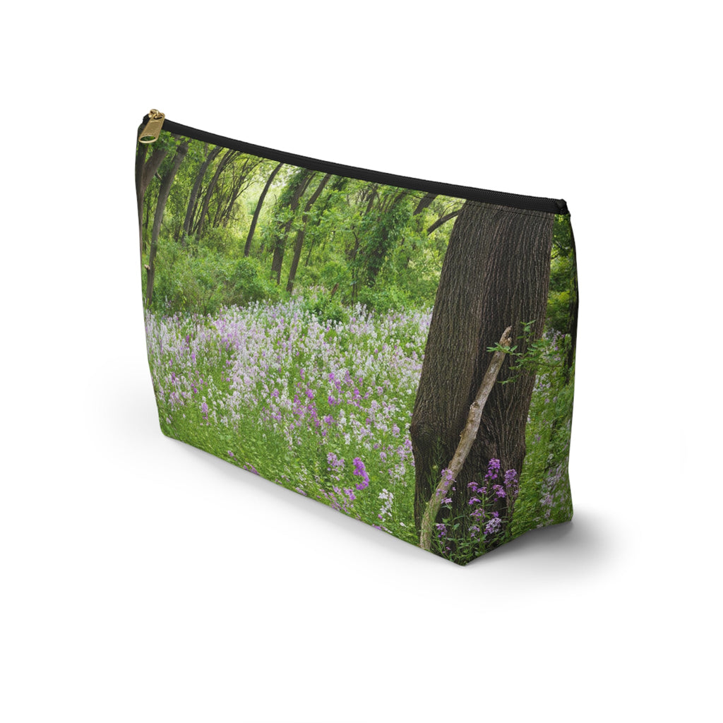 Front view of the kit bag with forest wildflowers design angled to showcase the depth and all over print design.