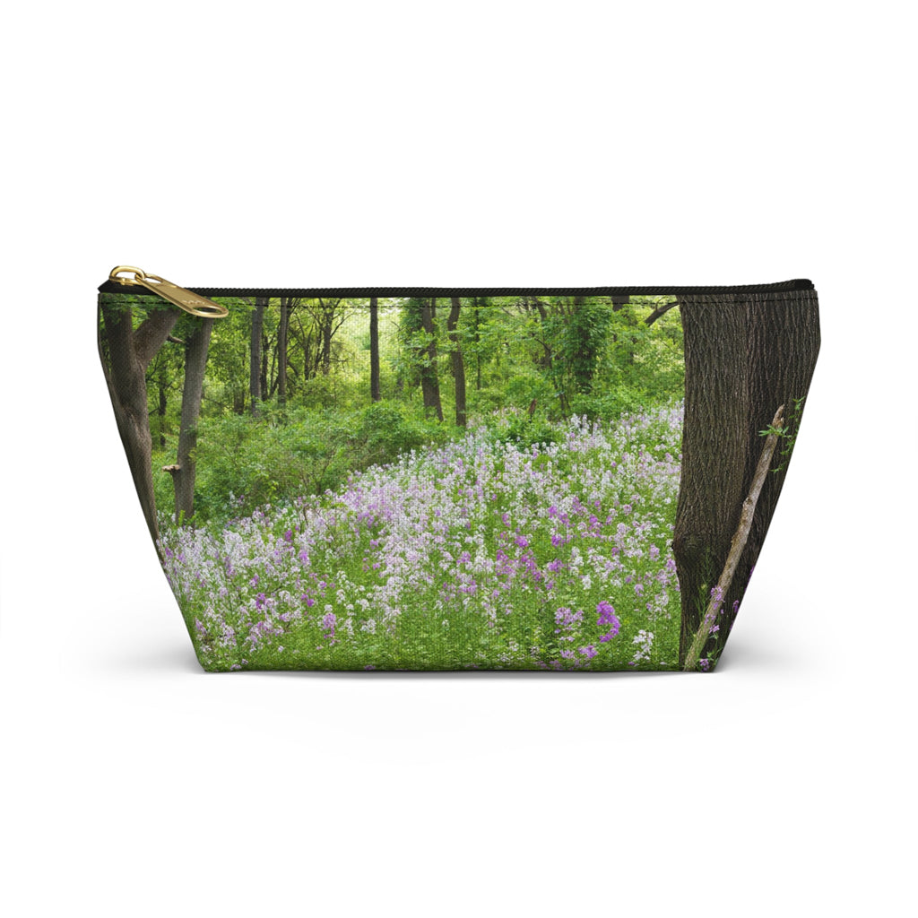 Front view of the small 8.75 x 4.75 x 2.25 inch kit bag with forest wildflowers design and black zipper.
