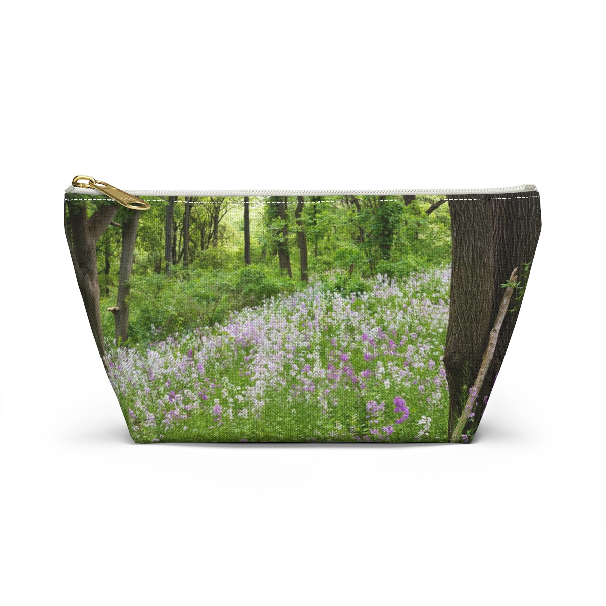 Front view of the small 8.75 x 4.75 x 2.25 inch kit bag with forest wildflowers design and white zipper.