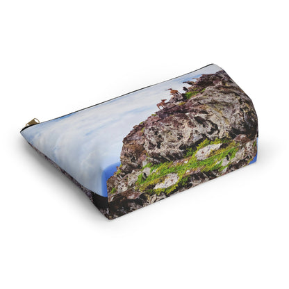 Bottom view of the kit bag with curious goats design angled to showcase the depth and all over print design.