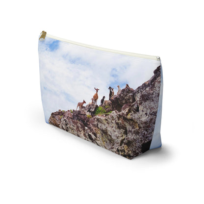 Front view of the kit bag with curious goats design angled to showcase the depth and all over print design.
