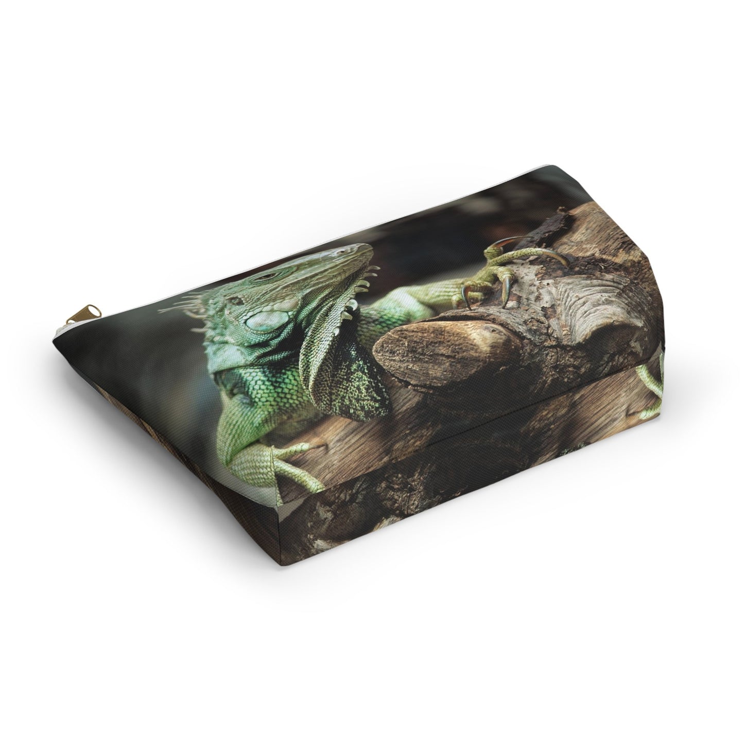 Bottom view of the kit bag with green iguana design angled to showcase the depth and all over print design.