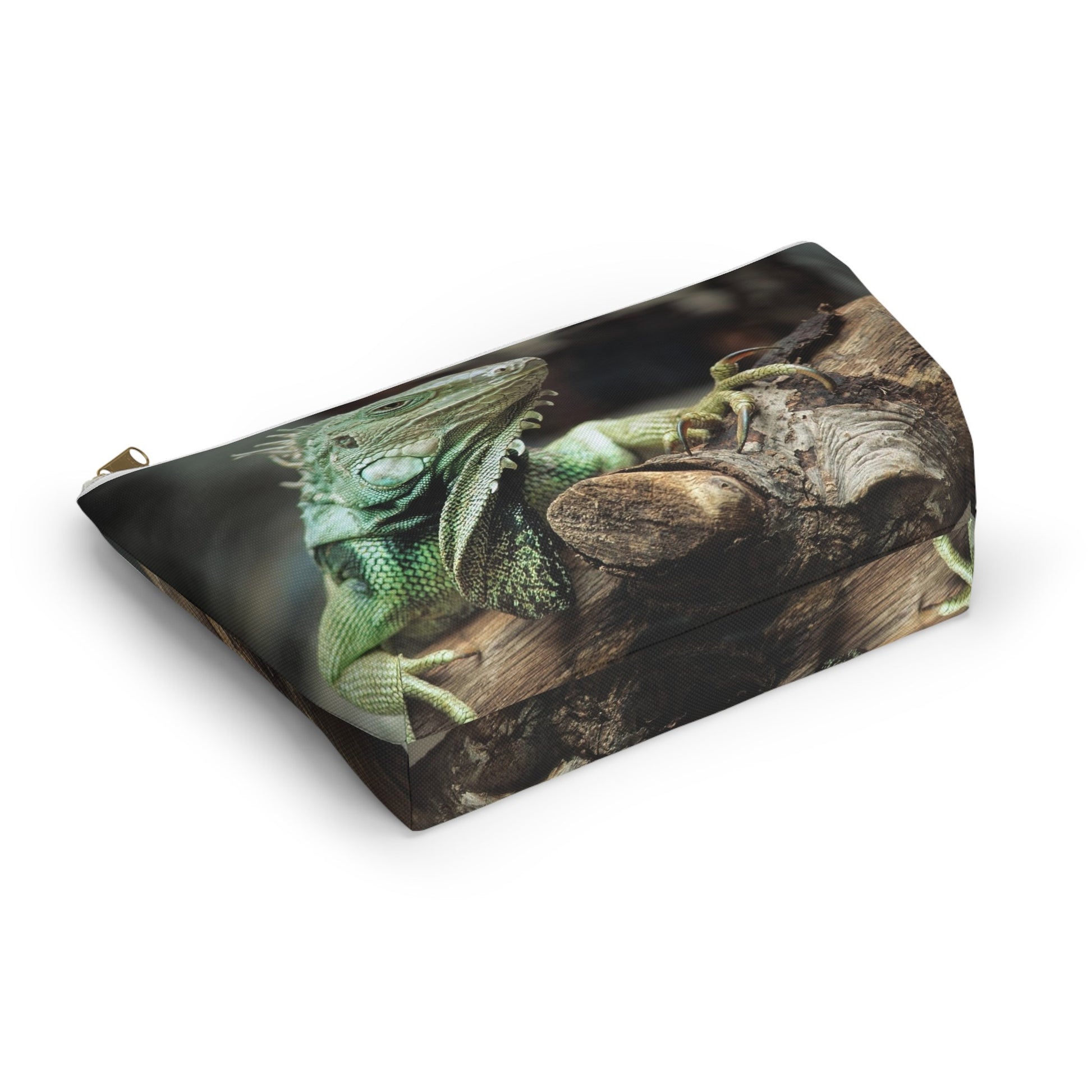 Bottom view of the kit bag with green iguana design angled to showcase the depth and all over print design.